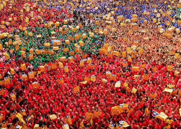 Catalonian pro-independence suupporters at a rally. Picture: Lluis Gene/AFP/Getty Images