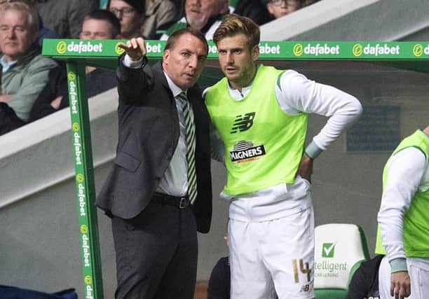 Brendan Rodgers issues instructions to Stuart Armstrong prior to the latter's introduction against Linfield. Picture: SNS