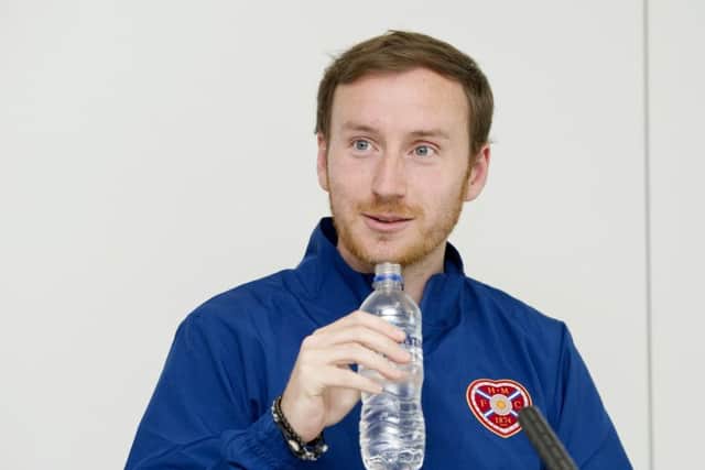 Ian Cathro wants all his players to have the hunger and ambition to progress in their careers. Picture: SNS.