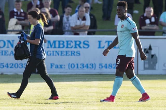 Hearts' Ashley Smith-Brown going off injured during the match against Elgin. Picture: SNS