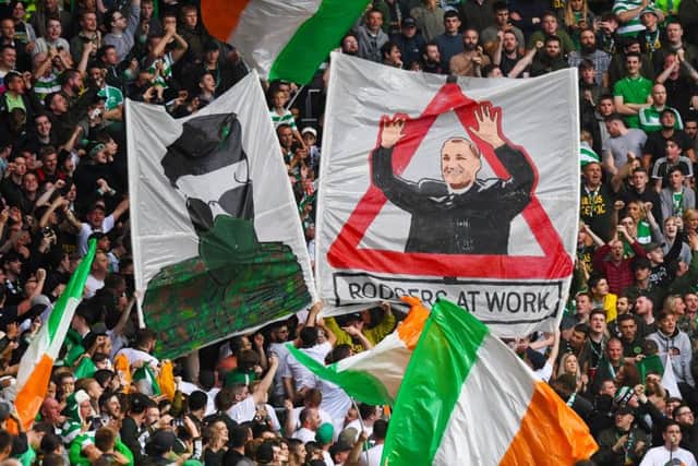 Celtic supporters display banners during the match against Linfield. Picture: SNS
