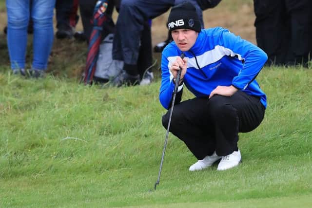 Drumoig's Connor Syme lines up a putt from the back of the firest green in the second round of The Open at Birkdale. Picture: PA