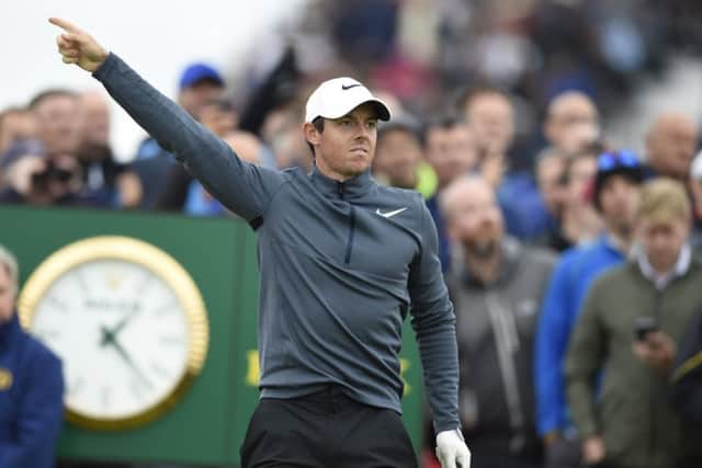 Rory McIlroy signals as his ball heads wide right off the 15th tee during the second round of the Open Championship yesterday. Picture Ian Rutherford