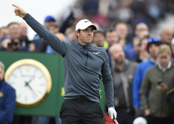 Rory McIlroy signals as his ball heads wide right off the 15th tee during the second round of the Open Championship yesterday. Picture Ian Rutherford