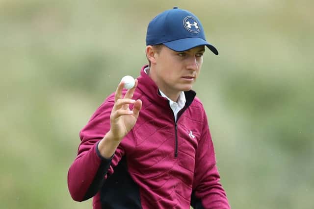 Jordan Spieth acknowledges the crowd after sinking a putt. Picture: Andrew Matthews/PA Wire