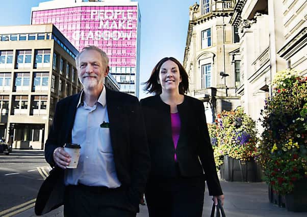 The Labour leader with Kezia Dugdale on a visit to Glasgow. Picture: John Devlin