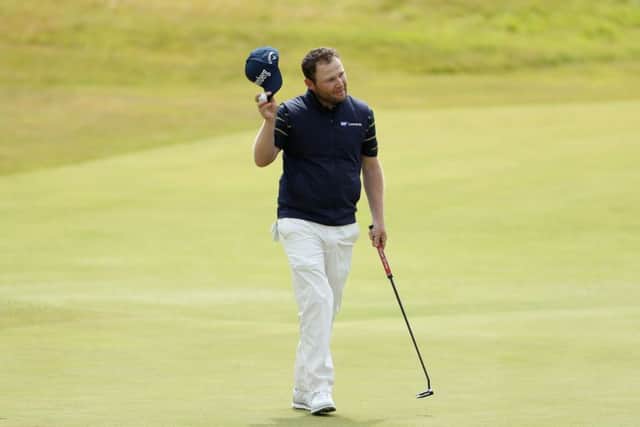 South African Branden Grace acknowledges the crowd after completing his eight-under-par 62 at Royal Birkdale. Picture: Getty Images