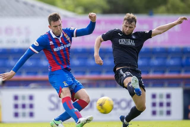 Inverness CT's Matty Elsdon battles for the ball against Falkirk's Rory Loy. Picture: SNS/Bill Murray