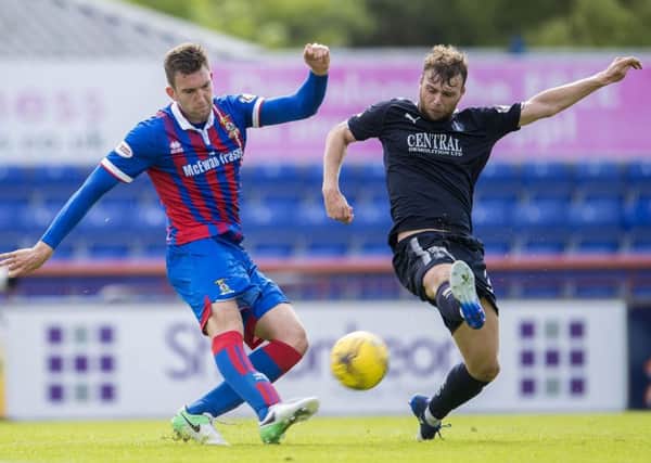 Inverness CT's Matty Elsdon battles for the ball against Falkirk's Rory Loy. Picture: SNS/Bill Murray