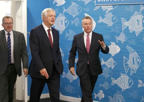 Secretary of State for the Department of Exiting the European Union David Davis (centre) has had a key role in Brexit talks. Picture; Jane Barlow