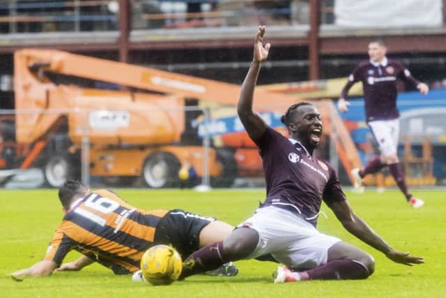 Isma Goncalves is brought down by East Fifes Ben gordon to earn Hearts late penalty. Picture: SNS.