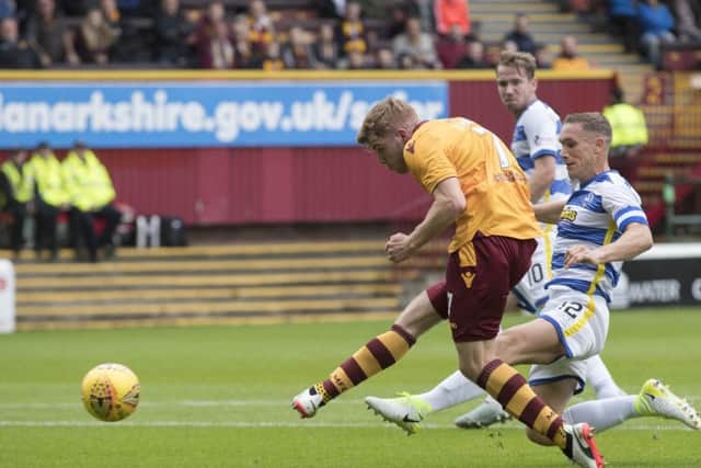 Chris Cadden scores Motherwells second goal in an easy win against Morton. Picture: Getty.