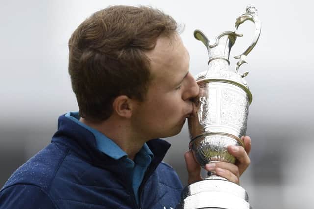Jordan Spieth kisses the Claret Jug after winning the Open with a sensational finish to his final round. Picture Ian Rutherford