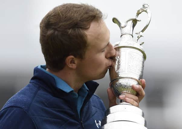 Jordan Spieth kisses the Claret Jug after winning the Open with a sensational finish to his final round. Picture Ian Rutherford