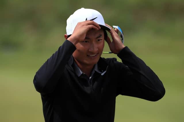 China's Li Haotong celebrates on the 18th after a final round of 63. Picture: PA