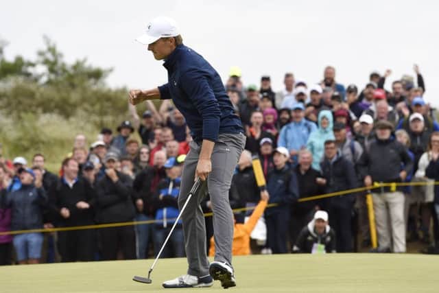 Jordan Spieth celebrates on the 16th after holing his birdie putt. Picture Ian Rutherford
