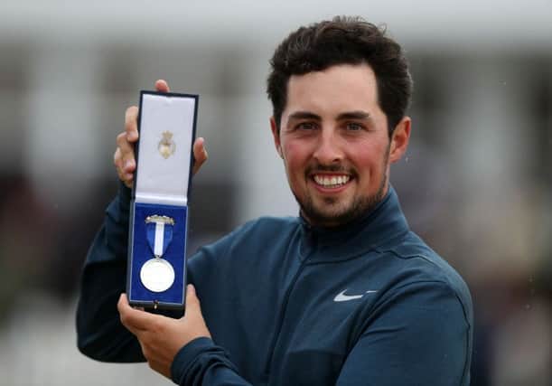 England's Alfie Plant with his silver medal for best amateur. Picture: PA