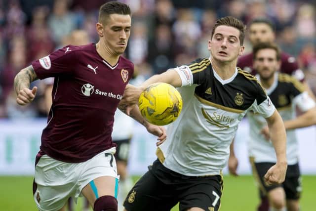 Hearts' Jamie Walker, left, and Aberdeen's Kenny McLean are wanted by Rangers. Pic: SNS