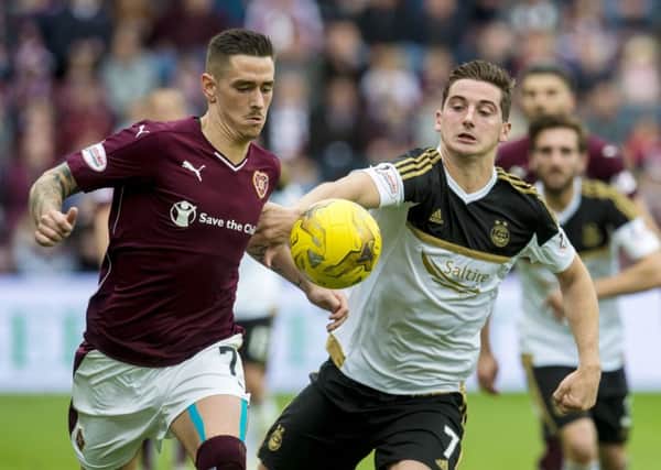 Hearts' Jamie Walker, left, and Aberdeen's Kenny McLean are wanted by Rangers. Pic: SNS