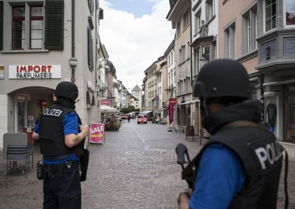 Police shut down the town of Schaffhausen in Switzerland, while they search for an unknown man who attacked people. Picture: AP