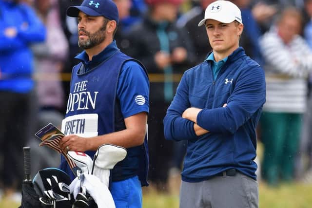 Caddie Mike Greller helps Jordan Spieth keep his cool during the final round of the Open Championship at Royal Birkdale on Sunday. Picture: Stuart Franklin/Getty Images