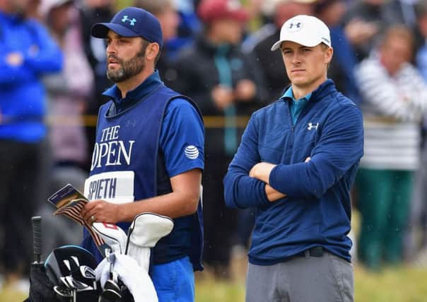 Caddie Mike Greller helps Jordan Spieth keep his cool during the final round of the Open Championship at Royal Birkdale on Sunday. Picture: Stuart Franklin/Getty Images