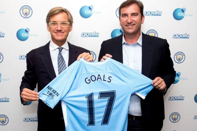 Goals chairman Nick Basing, left, with CFG chief executive Ferran Soriano. Picture: Contributed