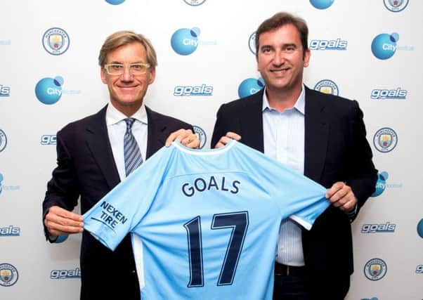 Goals chairman Nick Basing, left, with CFG chief executive Ferran Soriano. Picture: Contributed