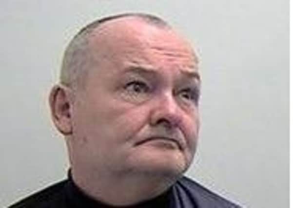 William Burns, 56, assaulted Russell Findlay while disguised as a postman on the doorstep of his home. Picture: Handout