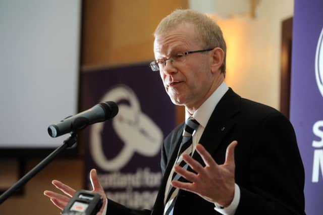 John Mason MSP urged to apologise for remarks made about police merger.