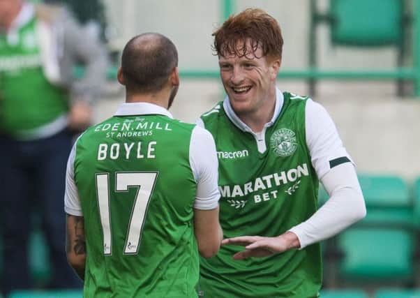 Simon Murray, right, celebrates with Martin Boyle after scoring the opener for Hibs. Picture: SNS