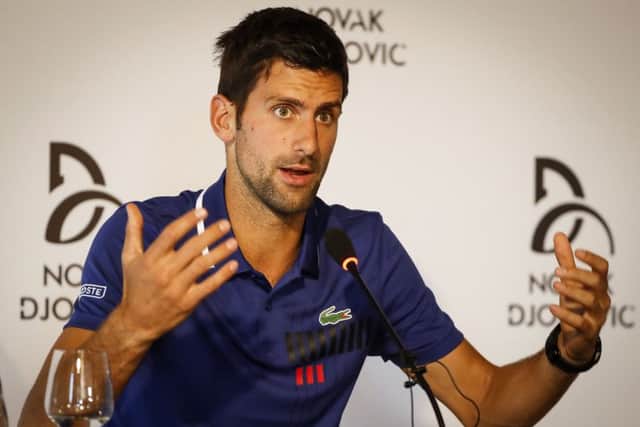 Novak Djokovic gestures to reporters in Belgrade as he announces that he will take part in no further tournaments this year. Picture: Srdjan Stevanovic/Getty