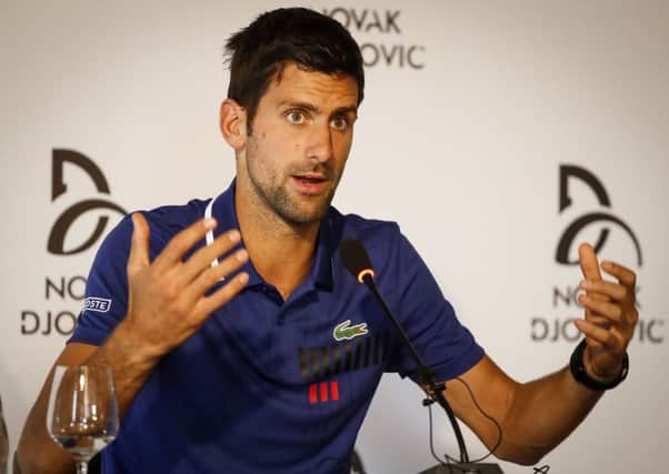 Novak Djokovic gestures to reporters in Belgrade as he announces that he will take part in no further tournaments this year. Picture: Srdjan Stevanovic/Getty