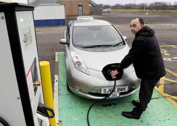Charging points for electric cars are on the increase, but the process will take considerably longer than filling up at the petrol station. Picture: Michael Gillen