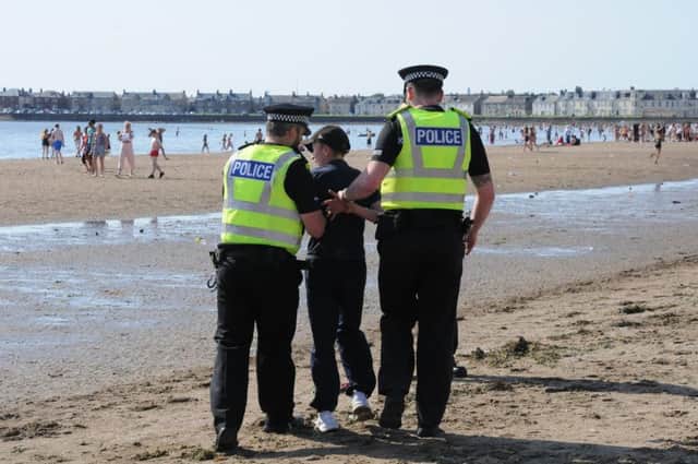 Teenagers behaving badly on the beach required police intervention