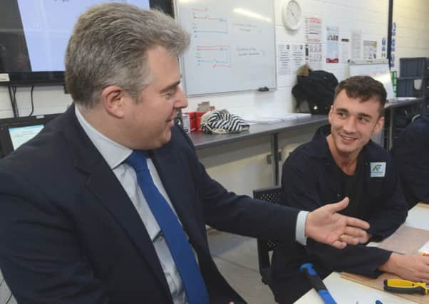 Brandon Lewis (left) said free movement of labour would end as of March 2019