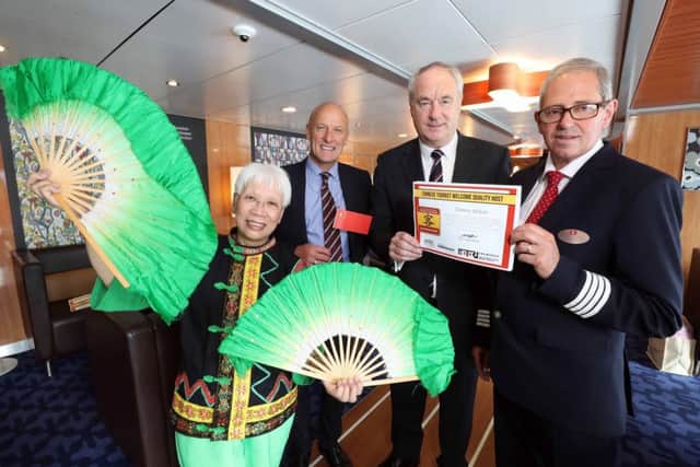 Stella Tsang, Northern Ireland Chinese Welfare Association , Stephen Bryden, Stena Line Onboard Sales and Service Manager (Irish Sea North), Dr Tony Lenehan, Exec Director of the Centre for Competitiveness and COTRI (Ireland) and Tommy Wilson, OBS Manager Superfast VIII. Picture: Stena Line/PA Wire