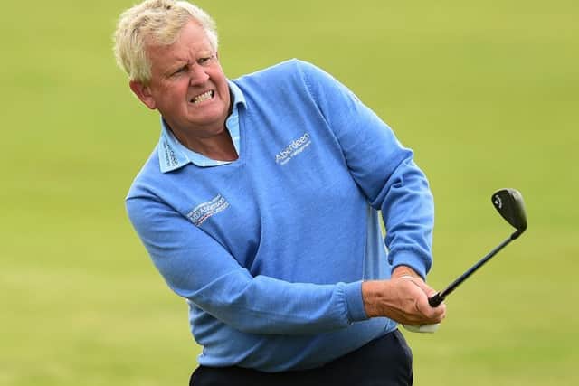 Colin Montgomerie hits an approach shot during the first round of the Senior Open Championship at Royal Porthcawl. Picture: Getty