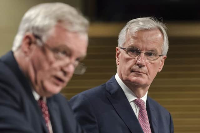 EU chief Brexit negotiator Michel Barnier, right, and British Secretary of State David Davis. Picture; AP