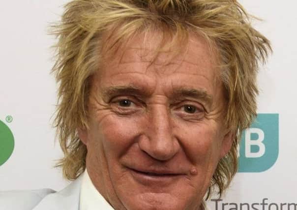 Rod Stewart has donated thousands of pounds to families of disabled children to cover the cost of joining a protest against cuts to medical funding. Picture; PA