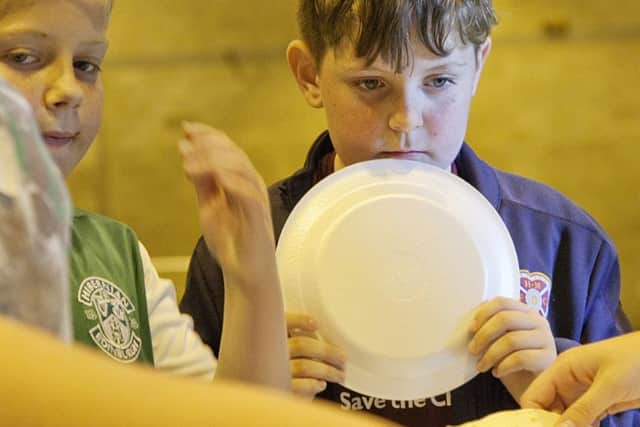Youngsters at the StreetGames holiday club enjoy a free lunch. Picture: Alistair Linford