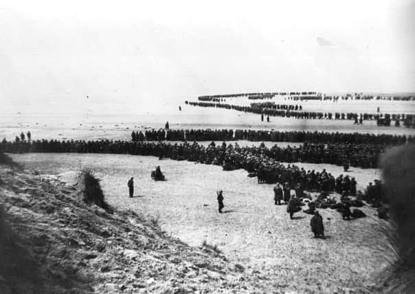 British and French troops wait on the dunes at Dunkirk. Picture: Topical Press Agency/Getty Images