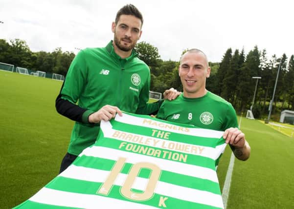 Craig Gordon and Scott Brown mark the announcement of Celtic FC Foundation's Â£10,000 donation to the Bradley Lowery Foundation. Picture: SNS