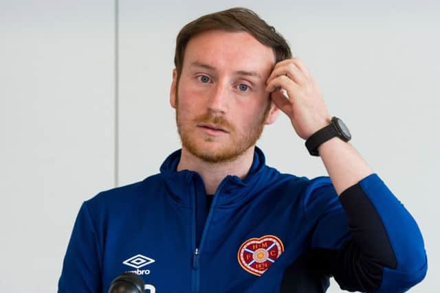 Hearts head coach Ian Cathro didn't want to disturb the full-time celebrations on the Peterhead bench