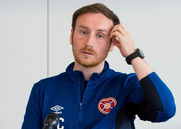 Hearts head coach Ian Cathro didn't want to disturb the full-time celebrations on the Peterhead bench