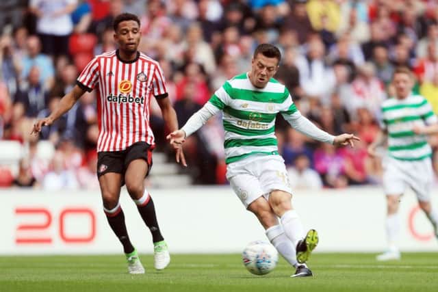 Celtic's Callum McGregor scores his sides second goal during the pre-season match at the Stadium of Ligh. Picture: Danny Lawson/PA Wire