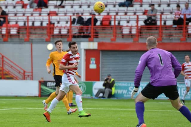 Hamilton's Steven Boyd scores to make it 3-0. Picture: SNS/Ross Parker
