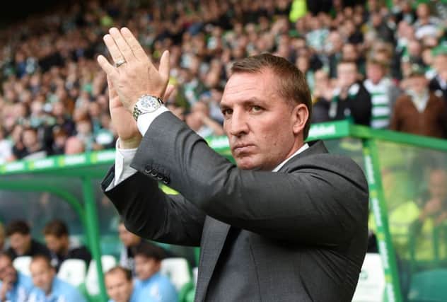 Brendan Rodgers applauds the fans after a rare blank against Rosenborg. Picture: SNS