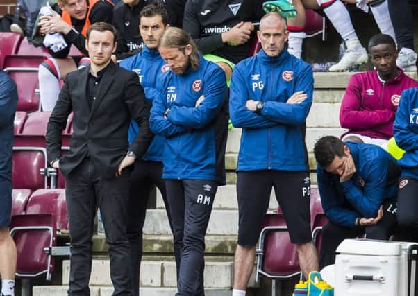 Hearts manager Ian Cathro (left) is coming under increasing pressure. Picture: SNS/Roddy Scott