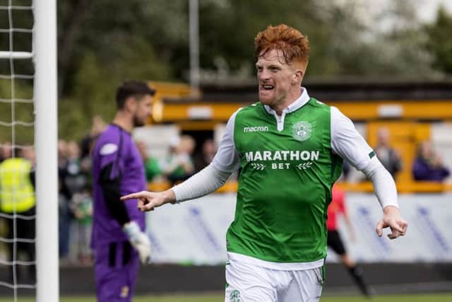 Simon Murray celebrates after heading home his second goal to seal Hibs' win over Alloa in the Betfred Cup. Picture: SNS
